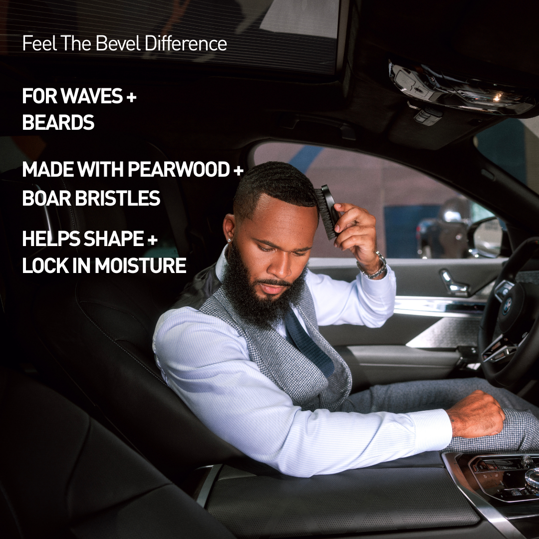 Man grooming himself with a beard brush inside a car, with text about product features.