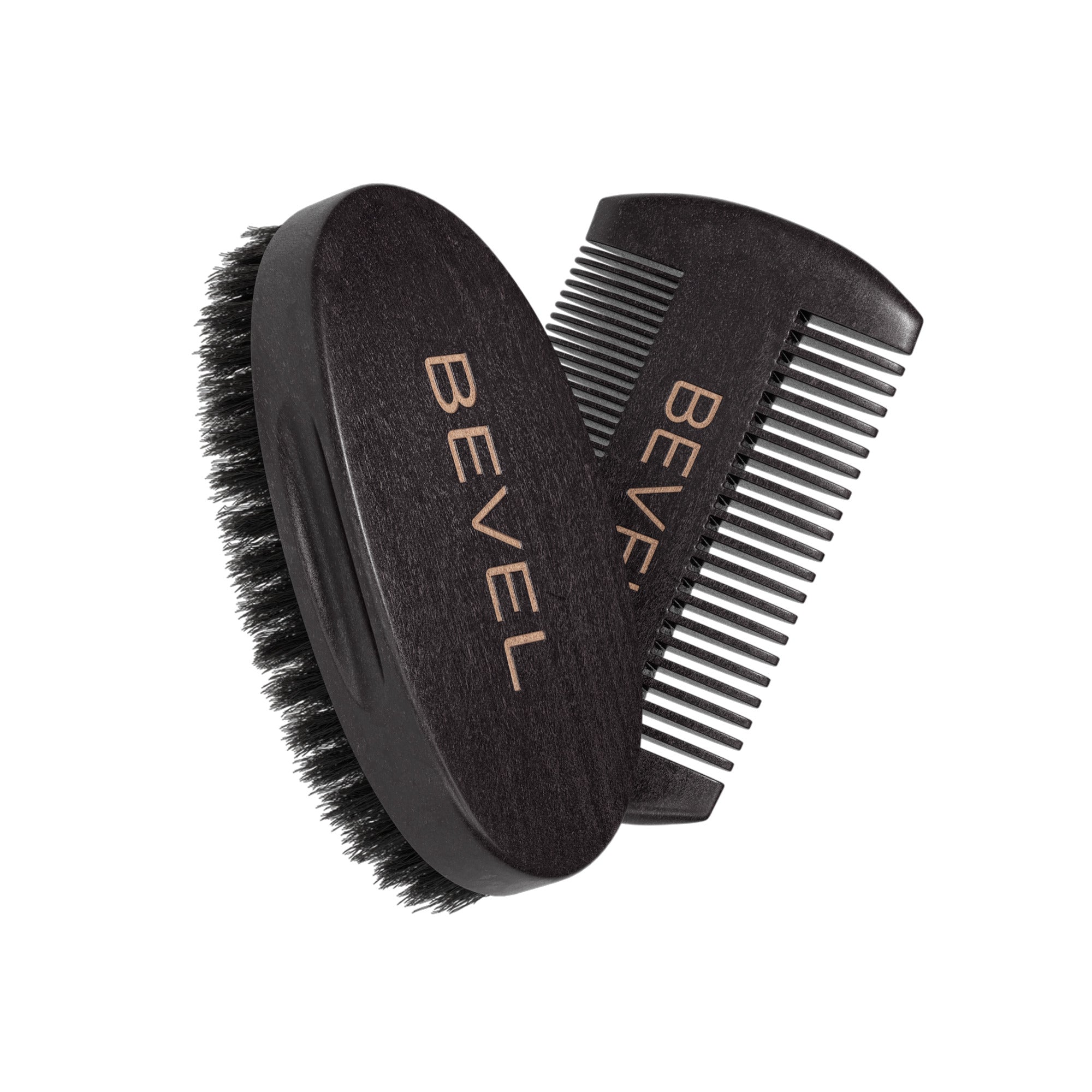A black brush and comb set with boar bristles, featuring the brand name 'BEVEL' on the comb.
