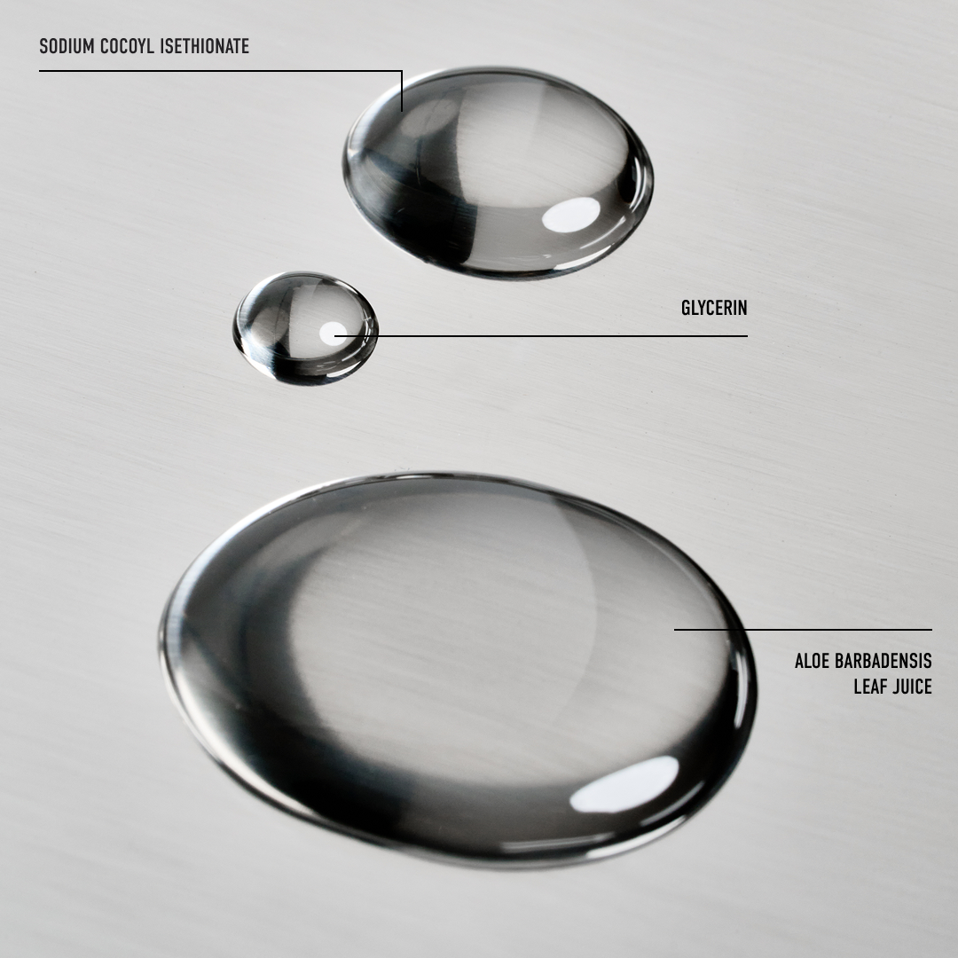 Three droplets labeled 'Sodium Cocoyl Isethionate', 'Glycerin', and 'Aloe Barbadensis Leaf Juice' on a gray background.