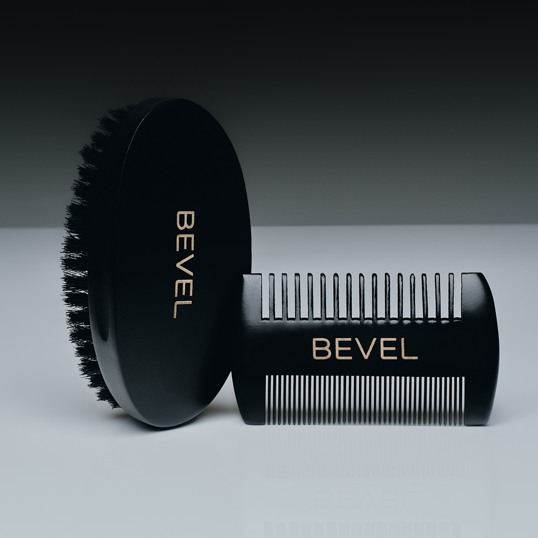 Black BEVEL brush and comb set on a gradient background