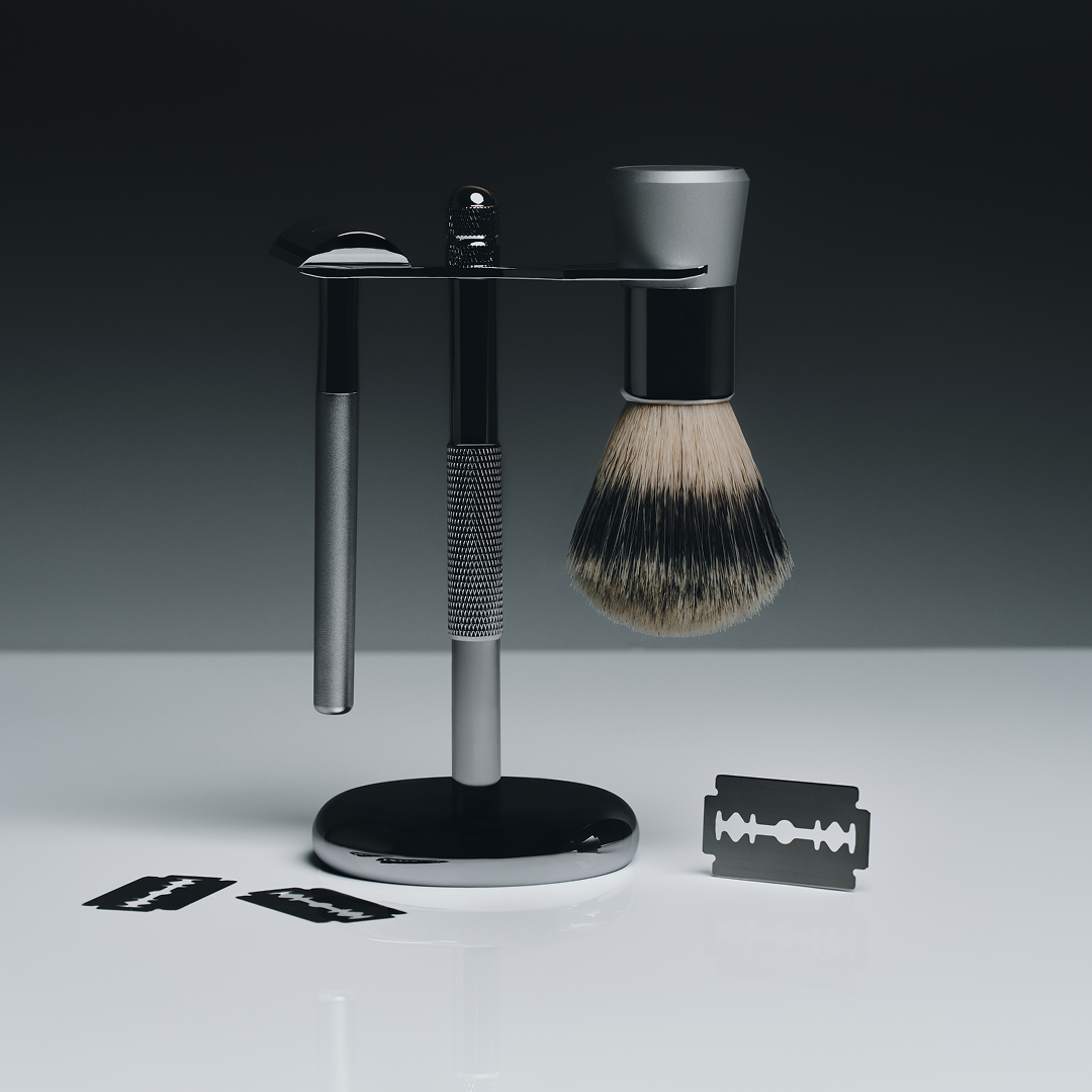 Shaving brush with stand and razors on a gradient background